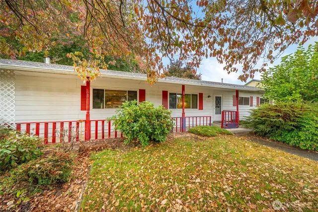 a front view of a house with garden