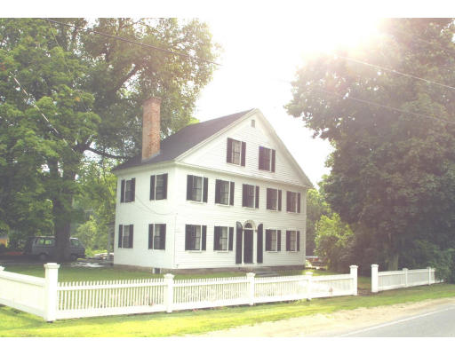 250 7 Bridge Road Lancaster, MA 01523 - Photo 1 of 5 a front view of a house with a yard