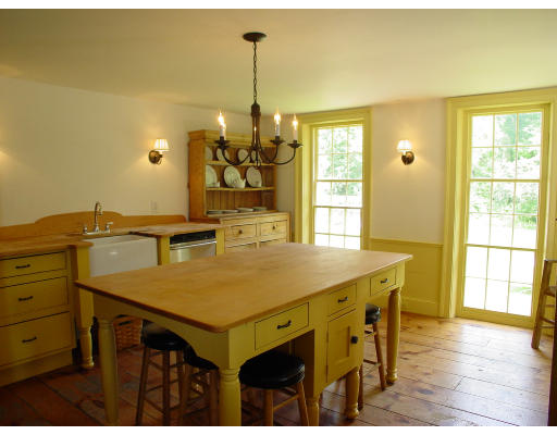250 7 Bridge Road Lancaster, MA 01523 - Photo 3 of 5 a view of a dining room with furniture window and wooden floor