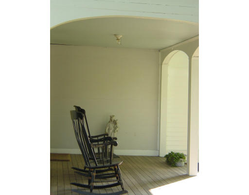 250 7 Bridge Road Lancaster, MA 01523 - Photo 5 of 5 a view of a room with a table and a chair