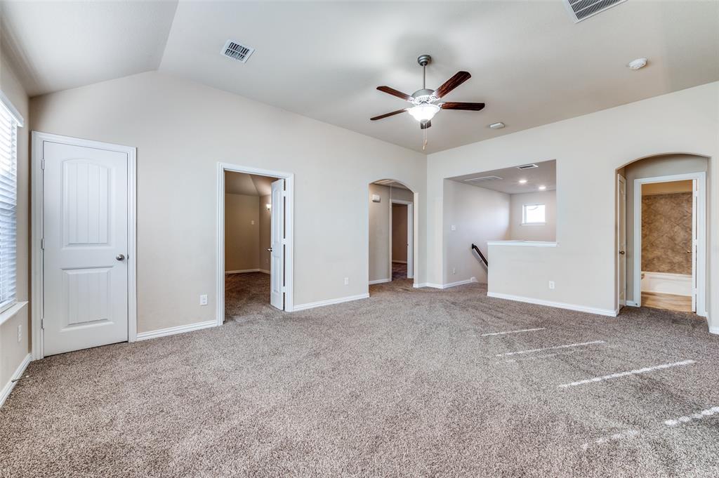 16008 Aquilla Way Prosper, TX 75078 - Photo 22 of 33 a view of a livingroom with a ceiling fan and window