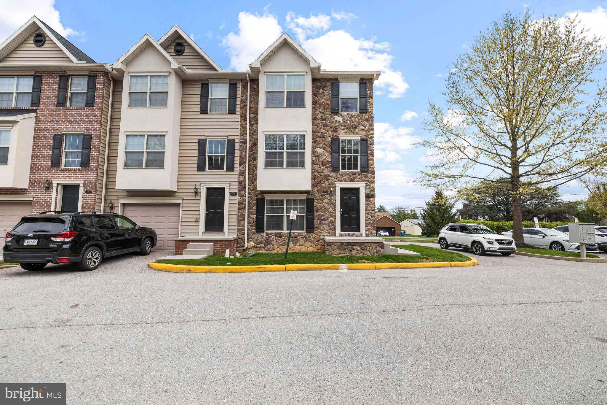 10 Shady Tree Court York, PA 17402 - Photo 1 of 1 a view of a white house with a swimming pool and a yard