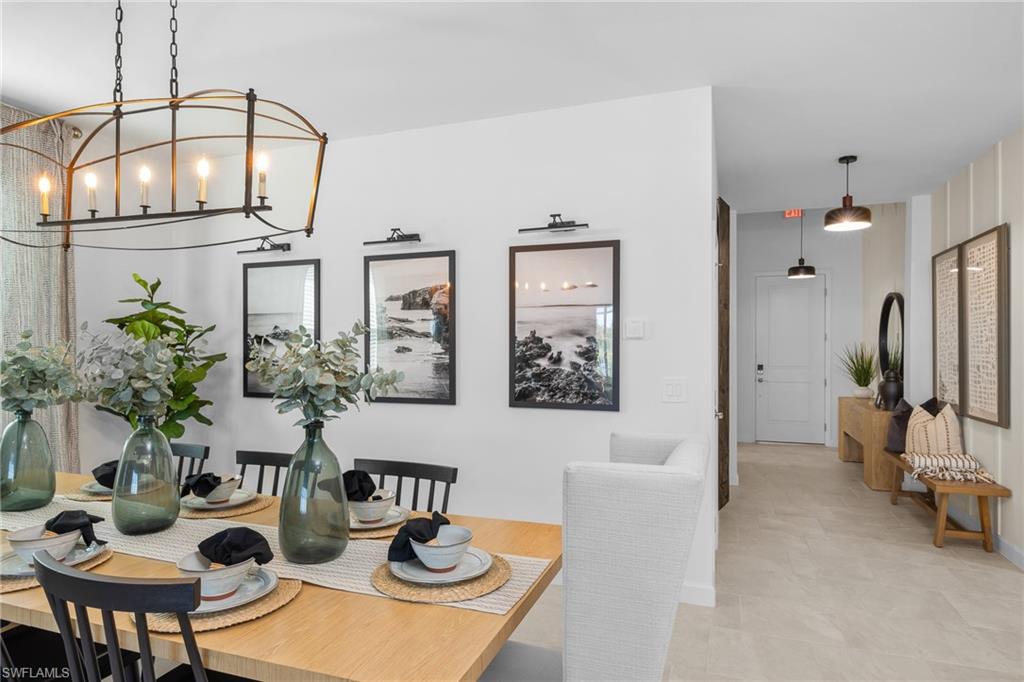 17752 Saddleback Loop North Fort Myers, FL 33917 - Photo 11 of 37 Dining room with a chandelier and baseboards