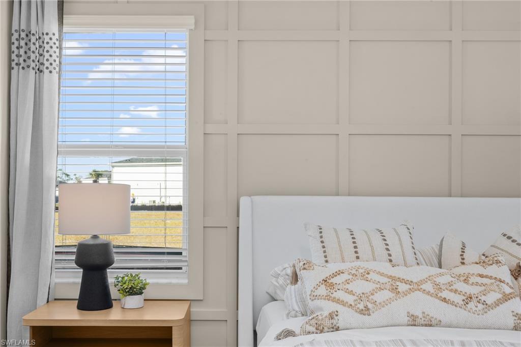 17752 Saddleback Loop North Fort Myers, FL 33917 - Photo 22 of 37 Bedroom featuring multiple windows