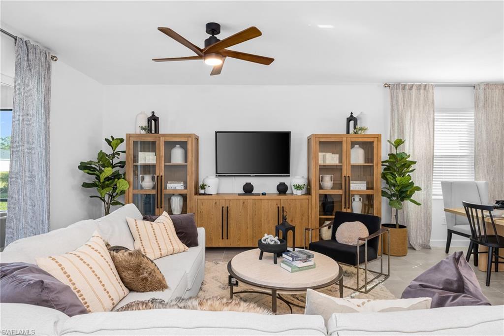 17752 Saddleback Loop North Fort Myers, FL 33917 - Photo 10 of 37 Living area with a ceiling fan