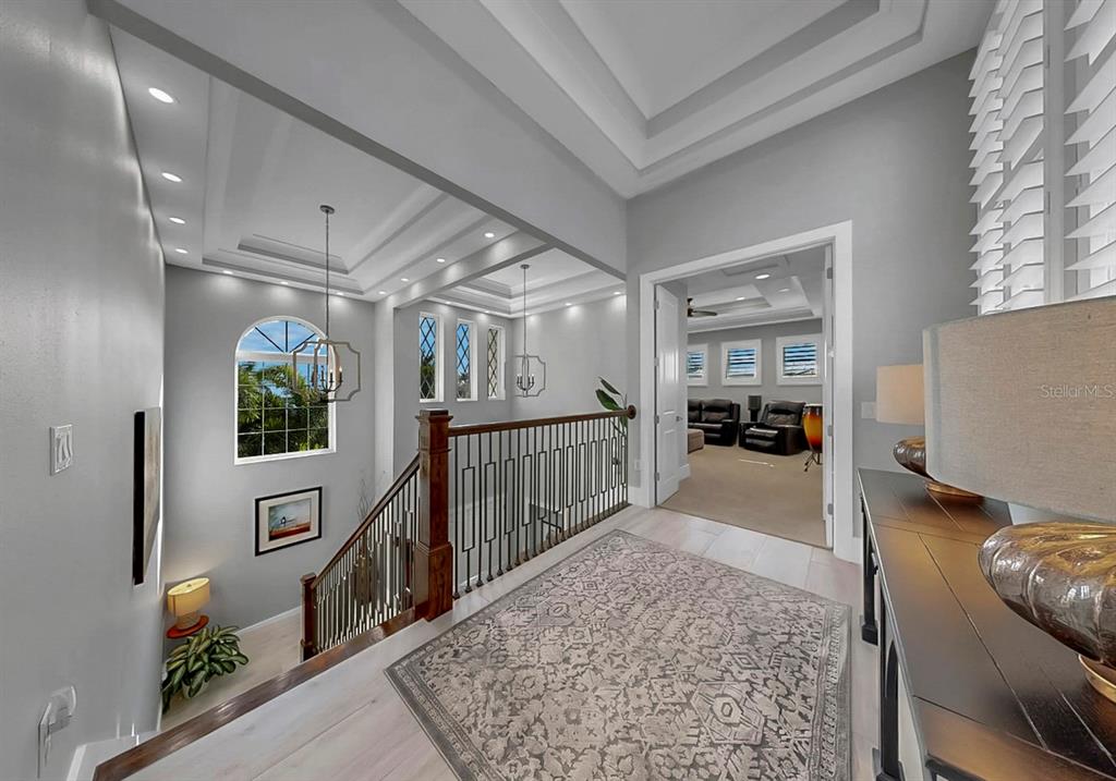 701 Pinckney Drive Apollo Beach, FL 33572 - Photo 36 of 99 a living room with furniture and a flat screen tv