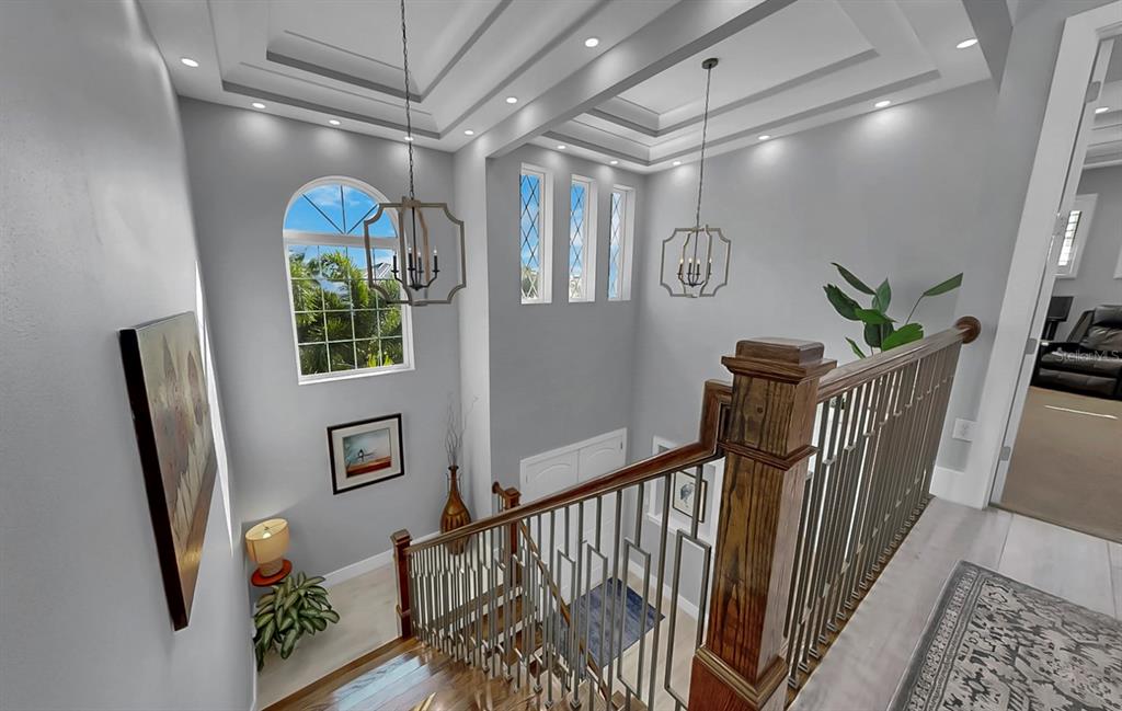 701 Pinckney Drive Apollo Beach, FL 33572 - Photo 39 of 99 a view of entryway with a front door and wooden floor