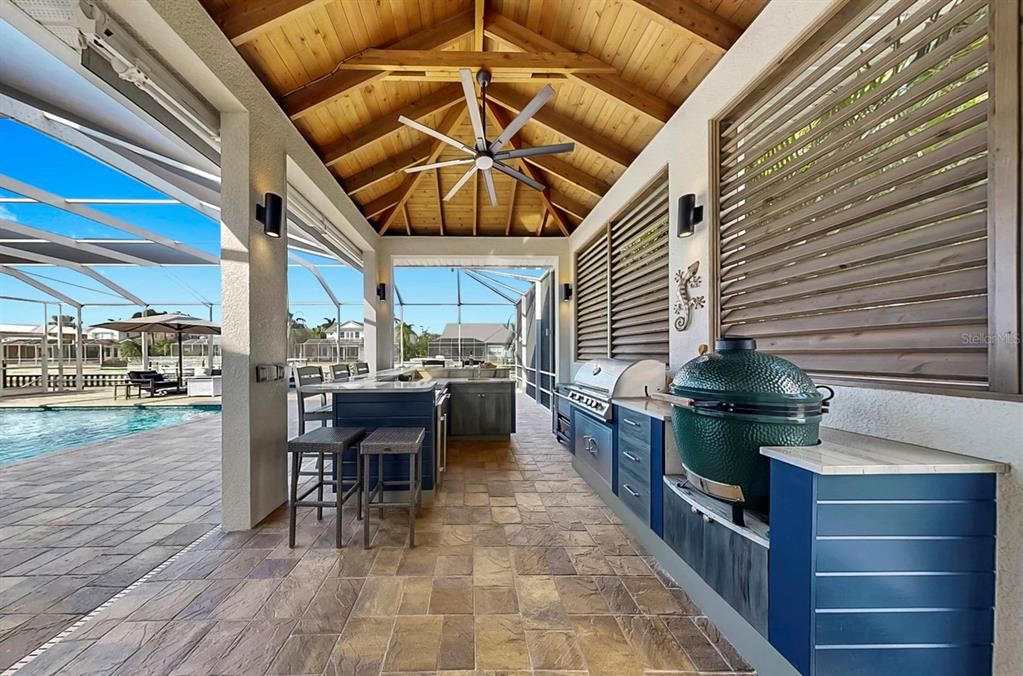 701 Pinckney Drive Apollo Beach, FL 33572 - Photo 57 of 99 a patio with table and chairs
