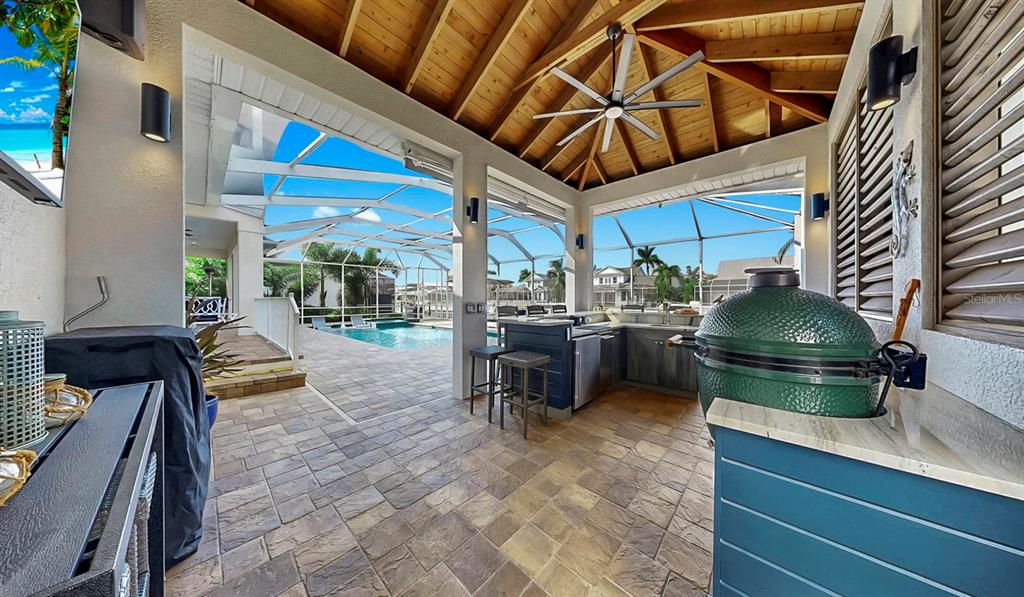 701 Pinckney Drive Apollo Beach, FL 33572 - Photo 60 of 99 a view of a chairs and table in a patio