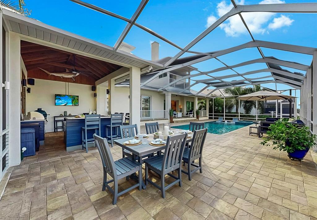 701 Pinckney Drive Apollo Beach, FL 33572 - Photo 72 of 99 a view of a backyard with a patio and outdoor seating