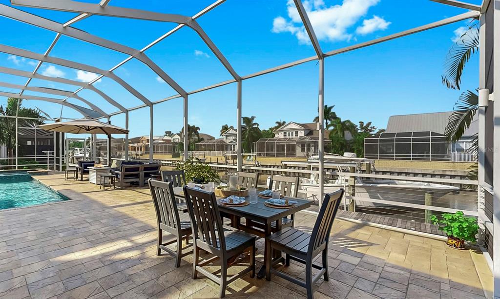 701 Pinckney Drive Apollo Beach, FL 33572 - Photo 72 of 99 a view of a swimming pool with a patio