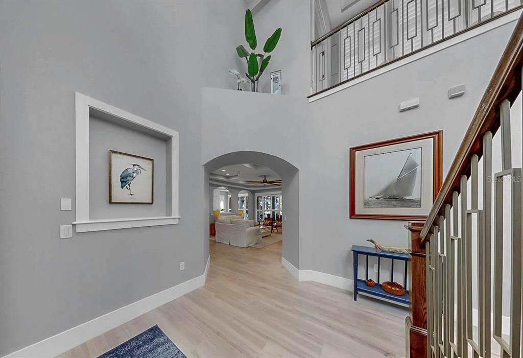 701 Pinckney Drive Apollo Beach, FL 33572 - Photo 8 of 99 a view of livingroom with hardwood floor and hallway