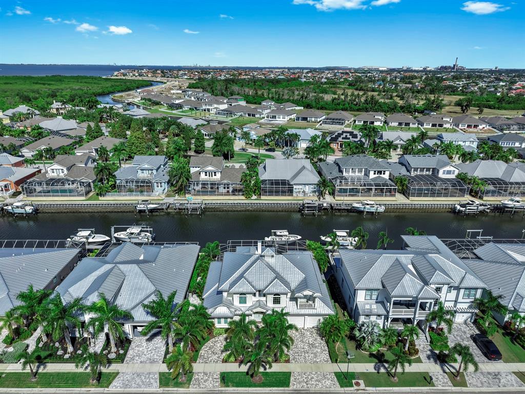 701 Pinckney Drive Apollo Beach, FL 33572 - Photo 82 of 99 an aerial view of a house with a lake view