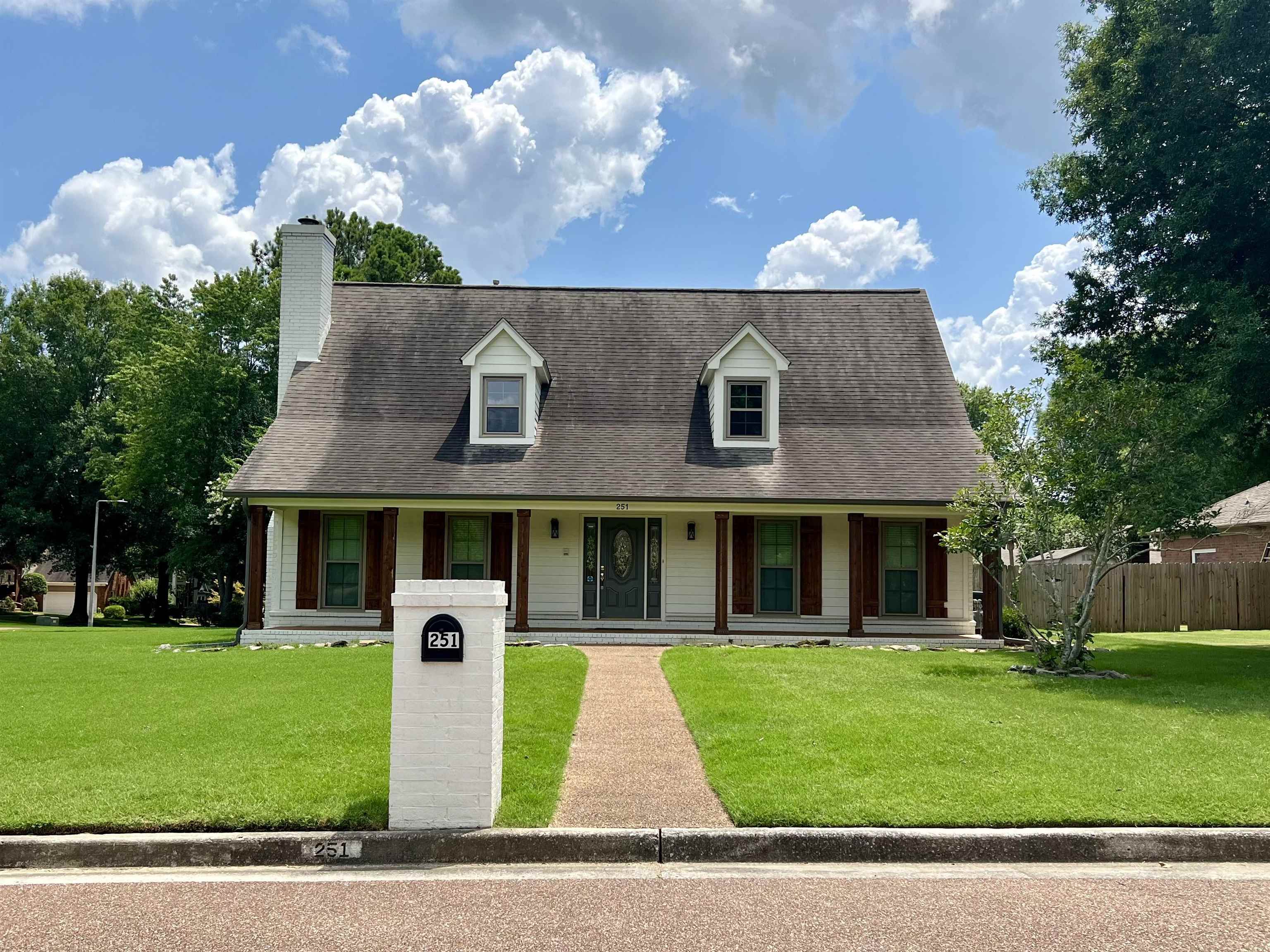 251 Songbird Road Collierville, TN 38017 - Photo 1 of 1 a front view of a house with a yard
