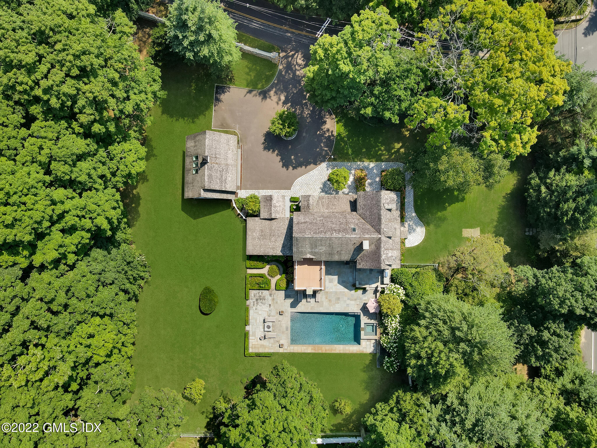 269 Stanwich Road Greenwich, CT 06830 - Photo 19 of 19 an aerial view of residential house with outdoor space and trees all around