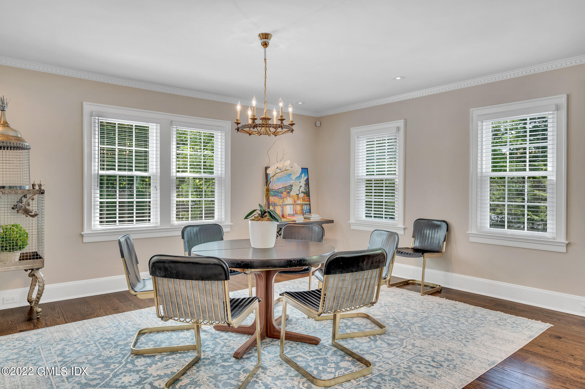 269 Stanwich Road Greenwich, CT 06830 - Photo 5 of 19 a dining room with furniture a rug and wooden floor