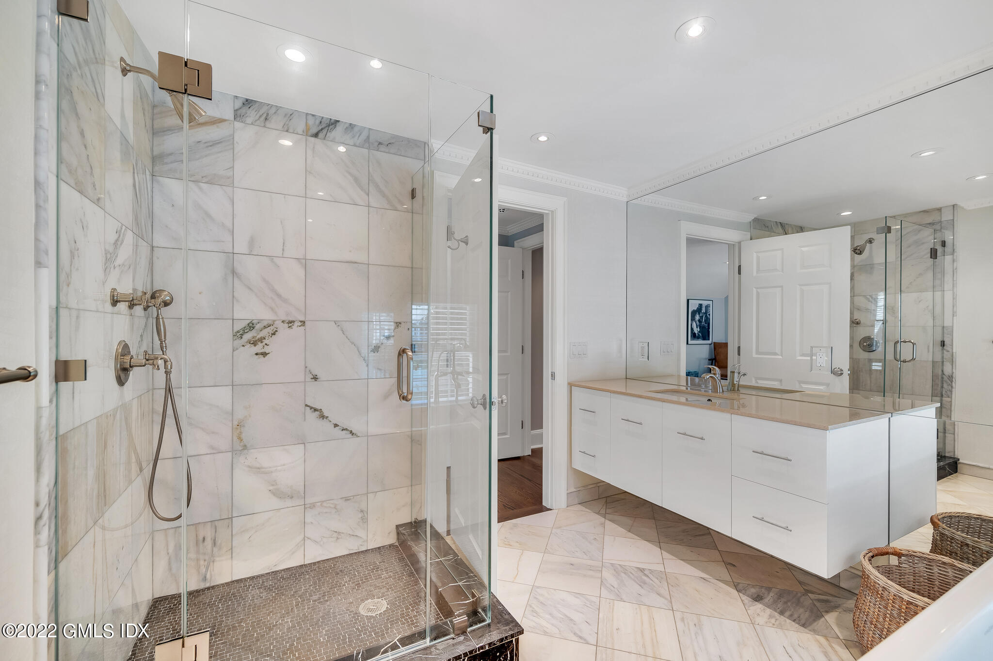 269 Stanwich Road Greenwich, CT 06830 - Photo 10 of 19 a bathroom with a double vanity sink mirror and shower