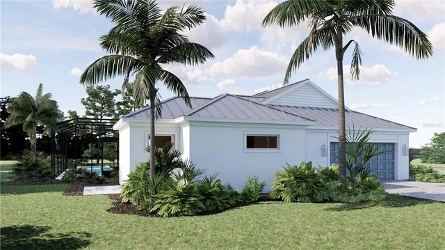 a view of a house with a yard and palm trees