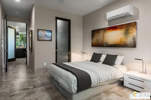 a bathroom with a double vanity sink toilet and shower