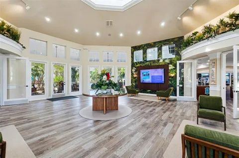 a living room with lots of furniture and rug