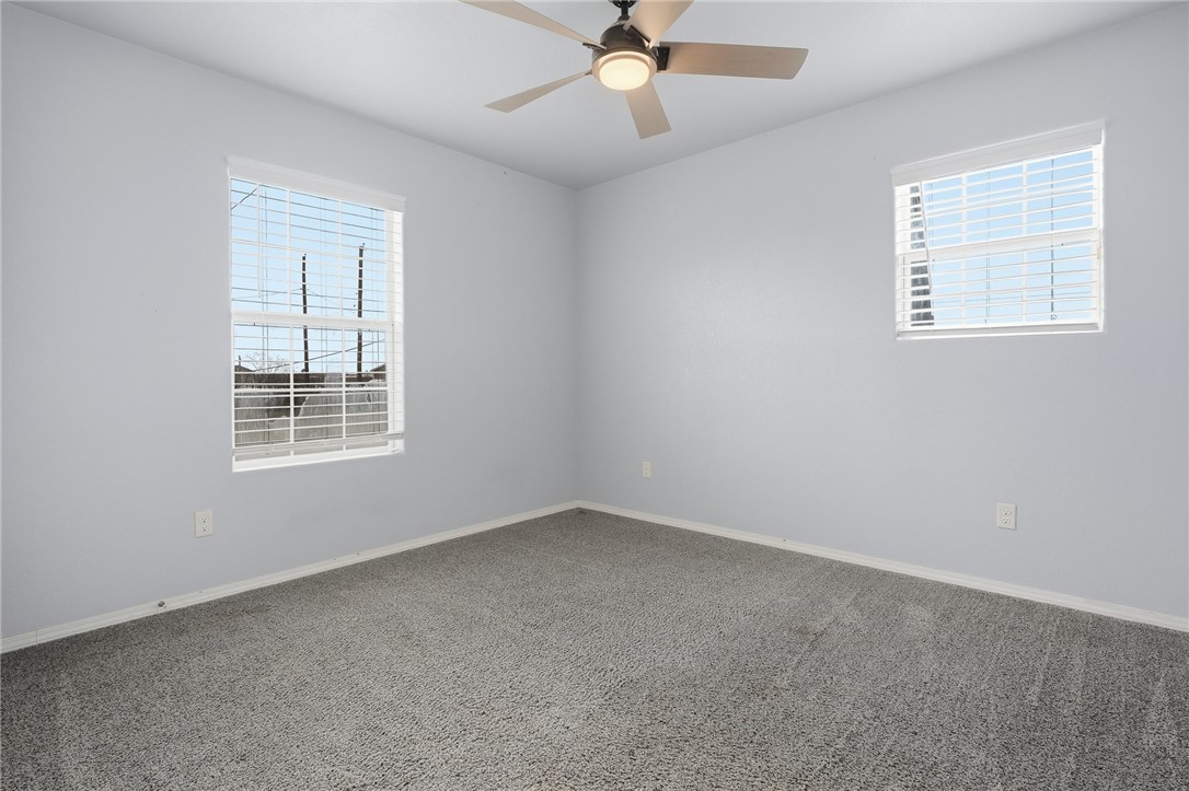 131 Janecek Road Rockport, TX 78382 - Photo 30 of 38 an empty room with a window and a fan