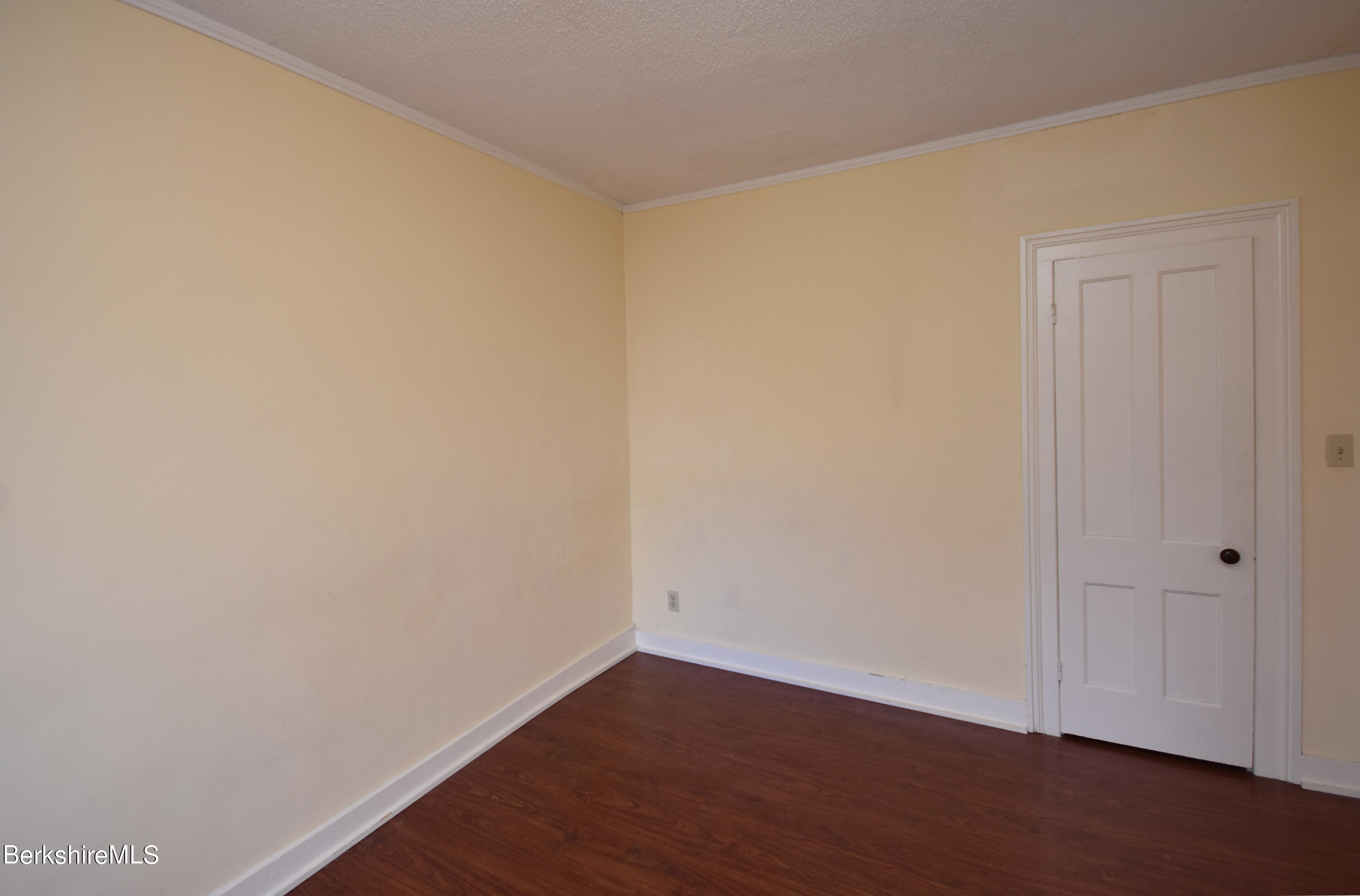 40-48 Reed Street Pittsfield, MA 01201 - Photo 11 of 35 a view of an empty room with wooden floor