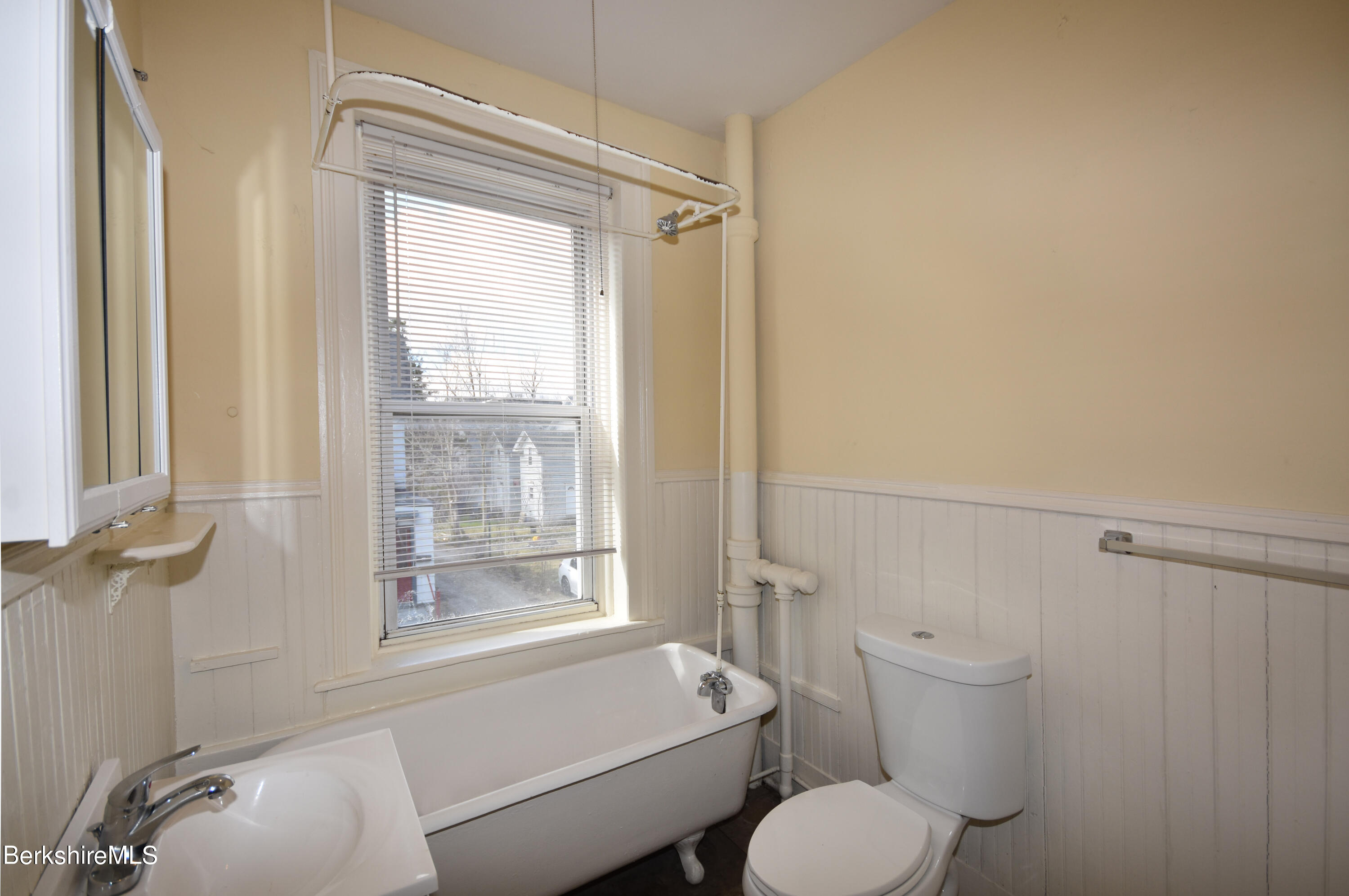 40-48 Reed Street Pittsfield, MA 01201 - Photo 14 of 35 a bathroom with a toilet and a shower