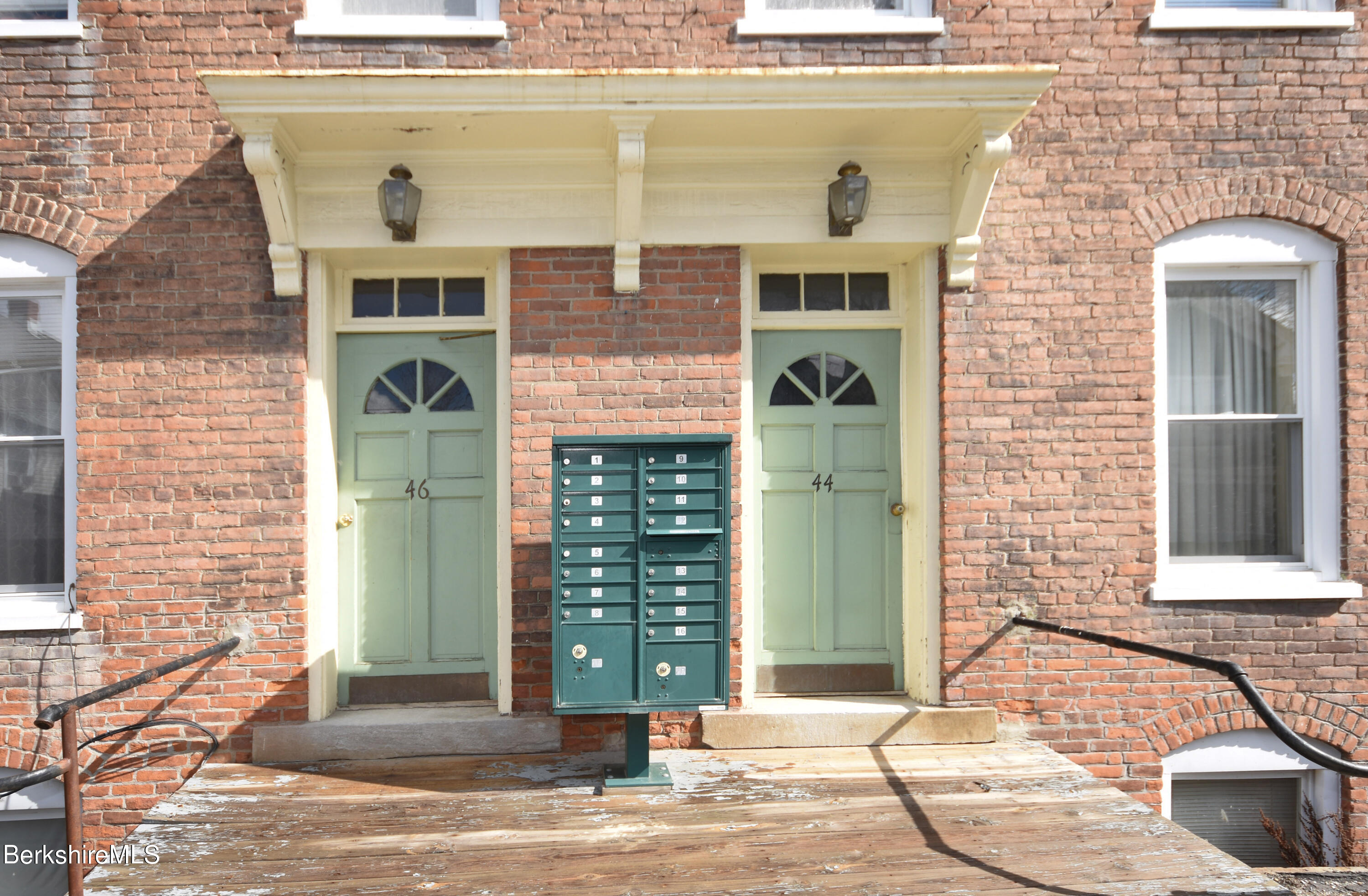 40-48 Reed Street Pittsfield, MA 01201 - Photo 2 of 35 a front view of a building with a glass door