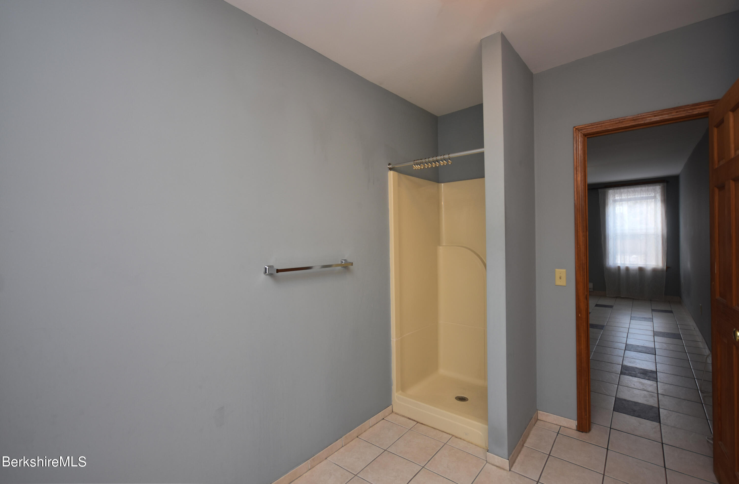 40-48 Reed Street Pittsfield, MA 01201 - Photo 23 of 35 a view of a bathroom with a glass door