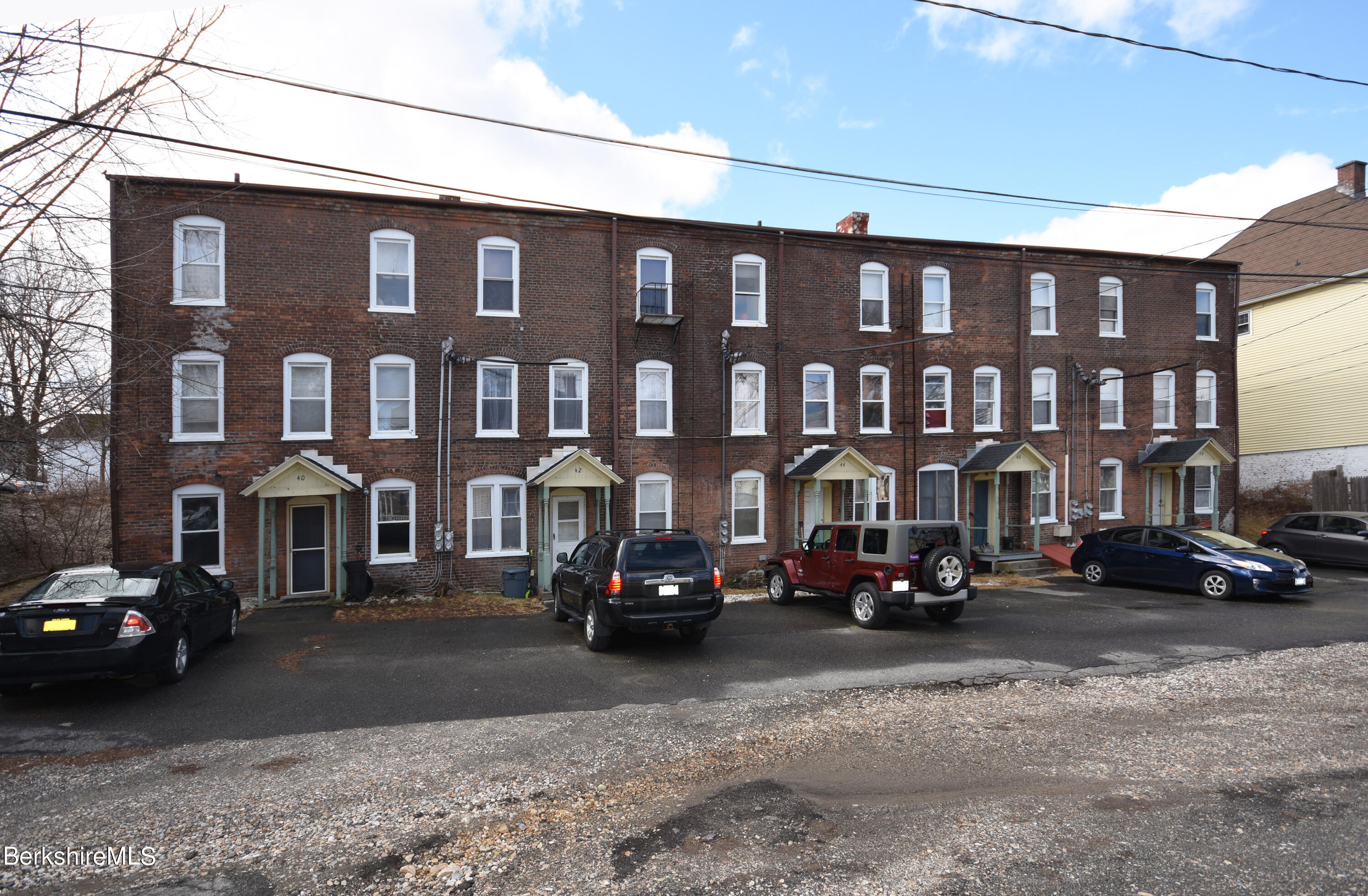40-48 Reed Street Pittsfield, MA 01201 - Photo 32 of 35 a car parked in front of a building