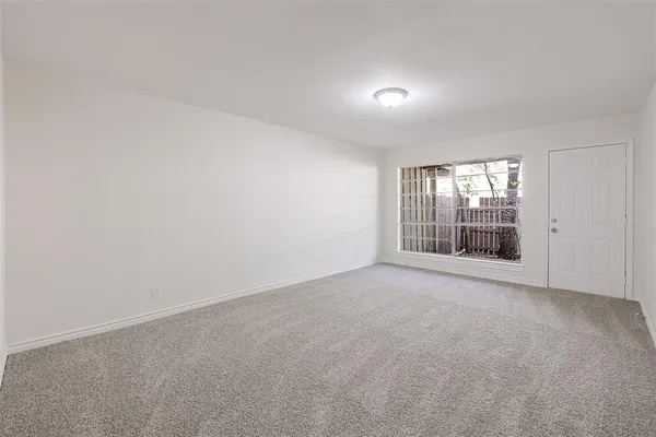 an empty room with an entryway