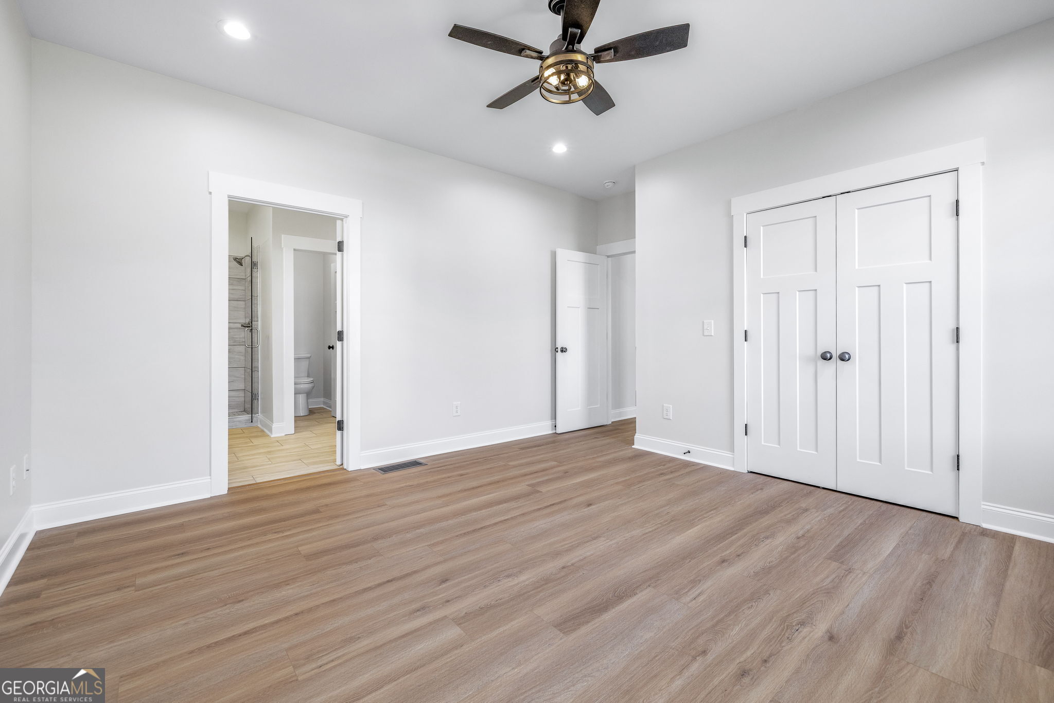 178 Hazel Creek Road Mount Airy, GA 30563 - Photo 13 of 34 a view of a livingroom with a hardwood floor