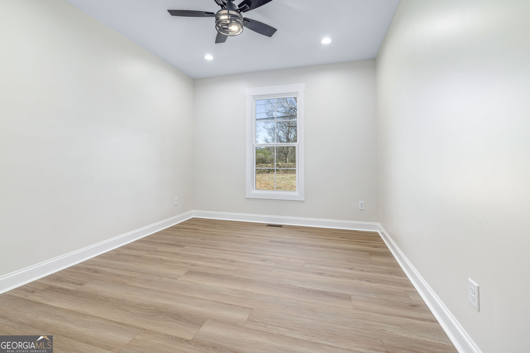 178 Hazel Creek Road Mount Airy, GA 30563 - Photo 17 of 34 a view of an empty room with a window