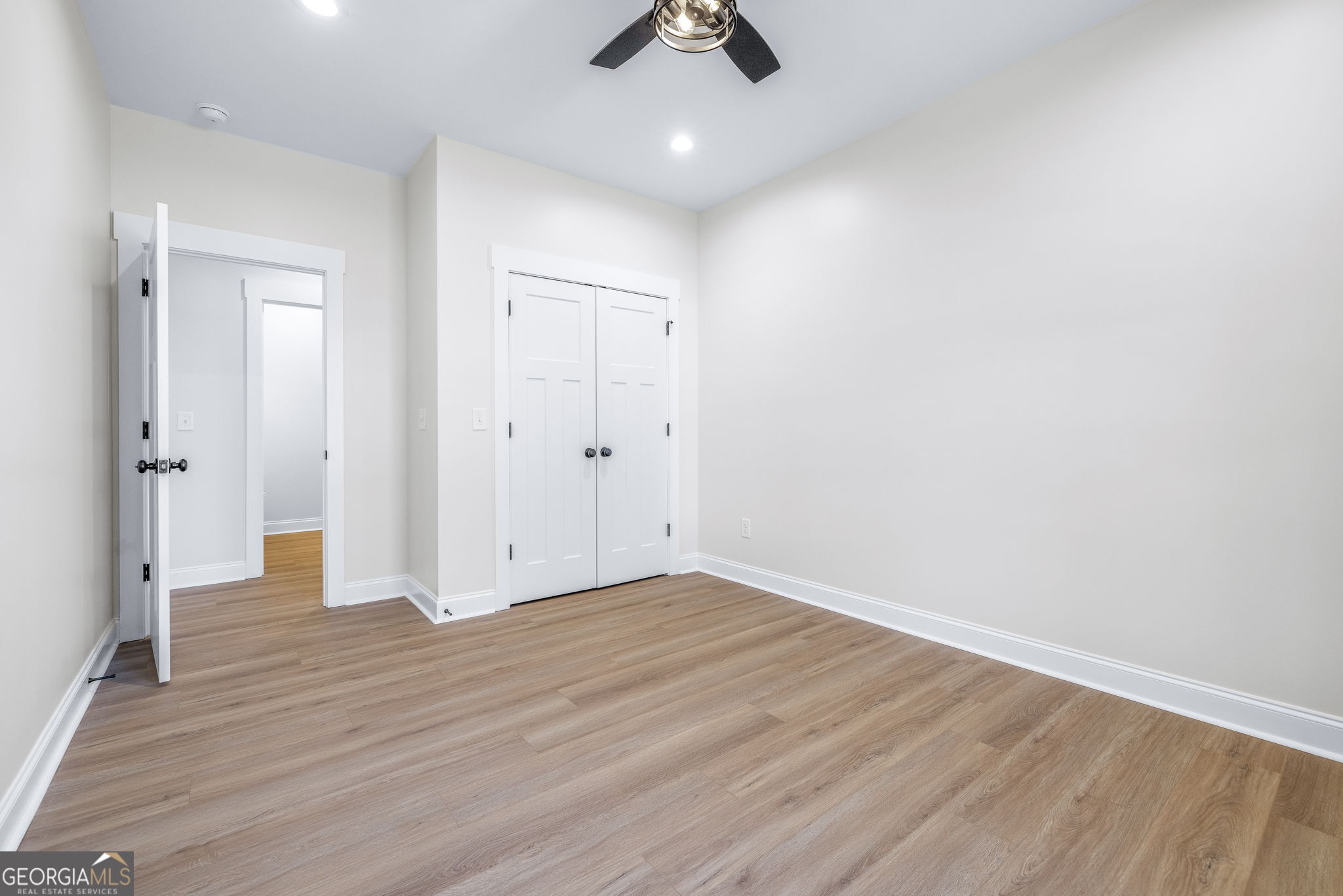 178 Hazel Creek Road Mount Airy, GA 30563 - Photo 18 of 34 wooden floor in an empty room