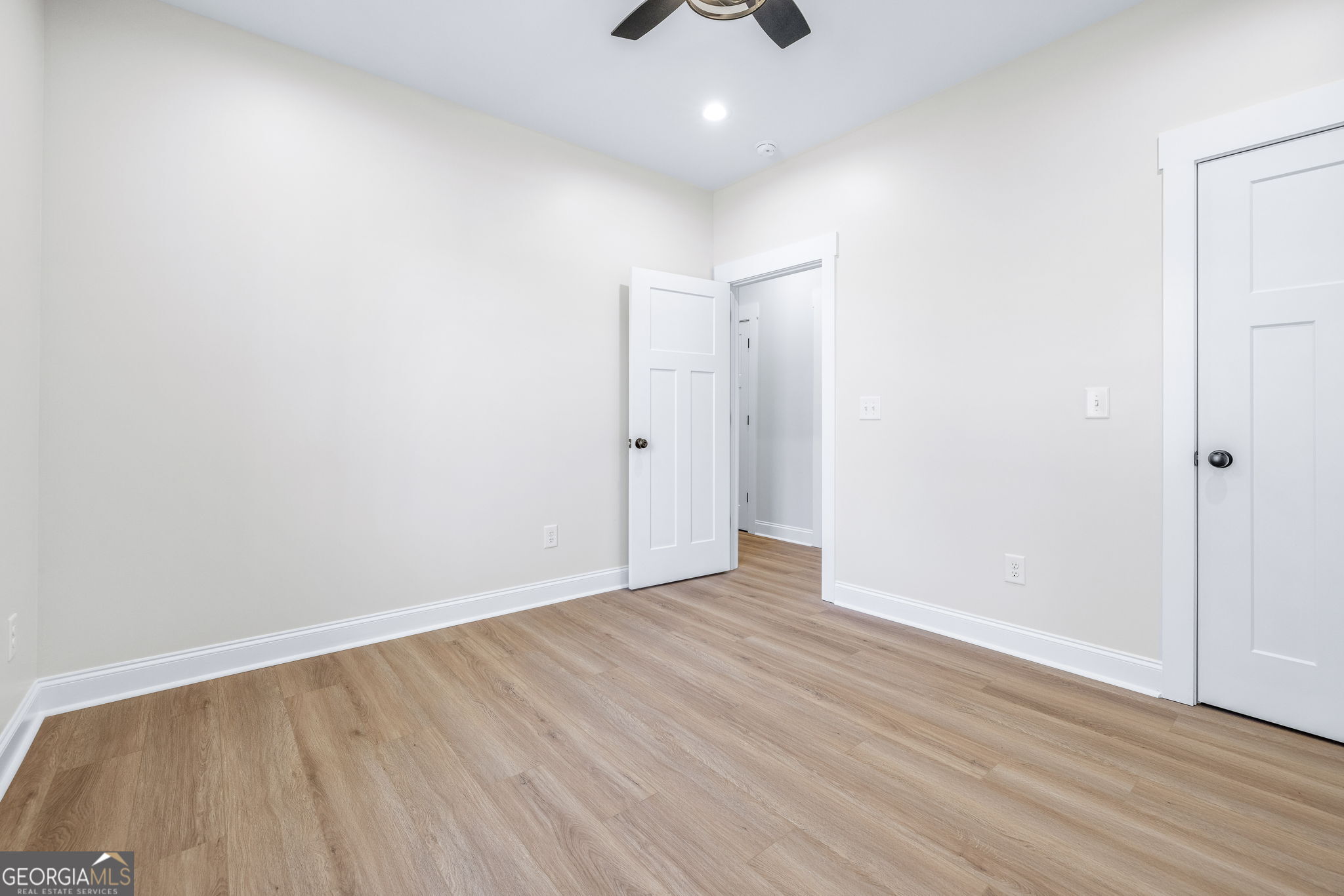 178 Hazel Creek Road Mount Airy, GA 30563 - Photo 20 of 34 a view of an empty room with wooden floor