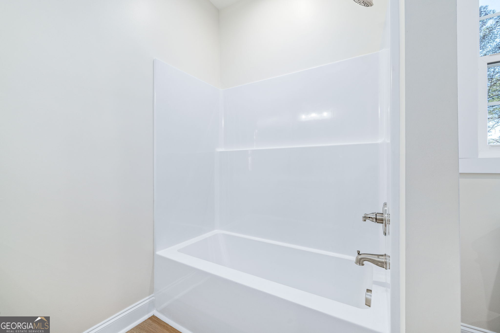 178 Hazel Creek Road Mount Airy, GA 30563 - Photo 24 of 34 a close up of a bathtub in a bathroom