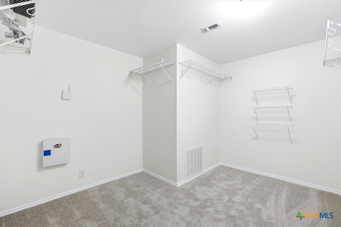 2030 Castleberry Ridge New Braunfels, TX 78130 - Photo 30 of 43 an empty room with a workbench