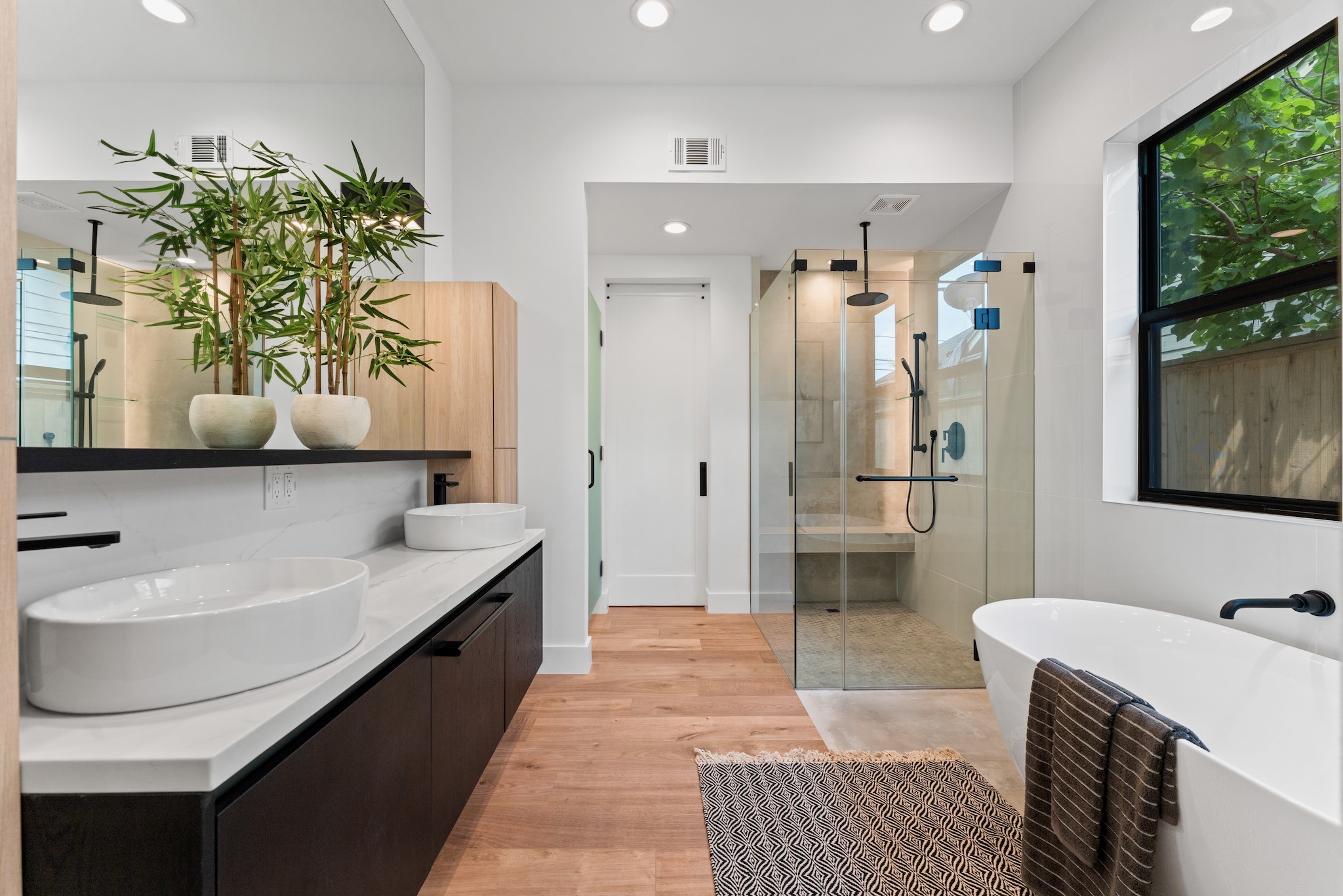 6711 Housman Houston, TX 77055 - Photo 23 of 49 a bathroom with a granite countertop sink and a mirror