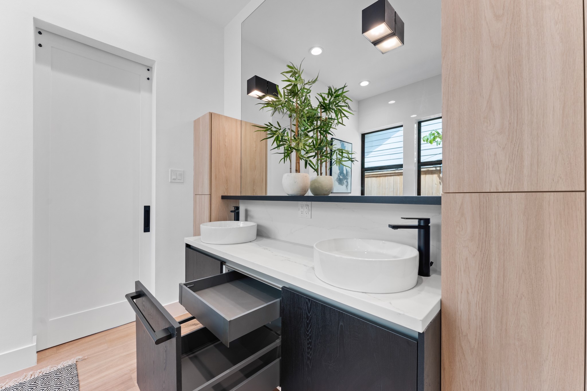 6711 Housman Houston, TX 77055 - Photo 24 of 49 a bathroom with a sink and a mirror