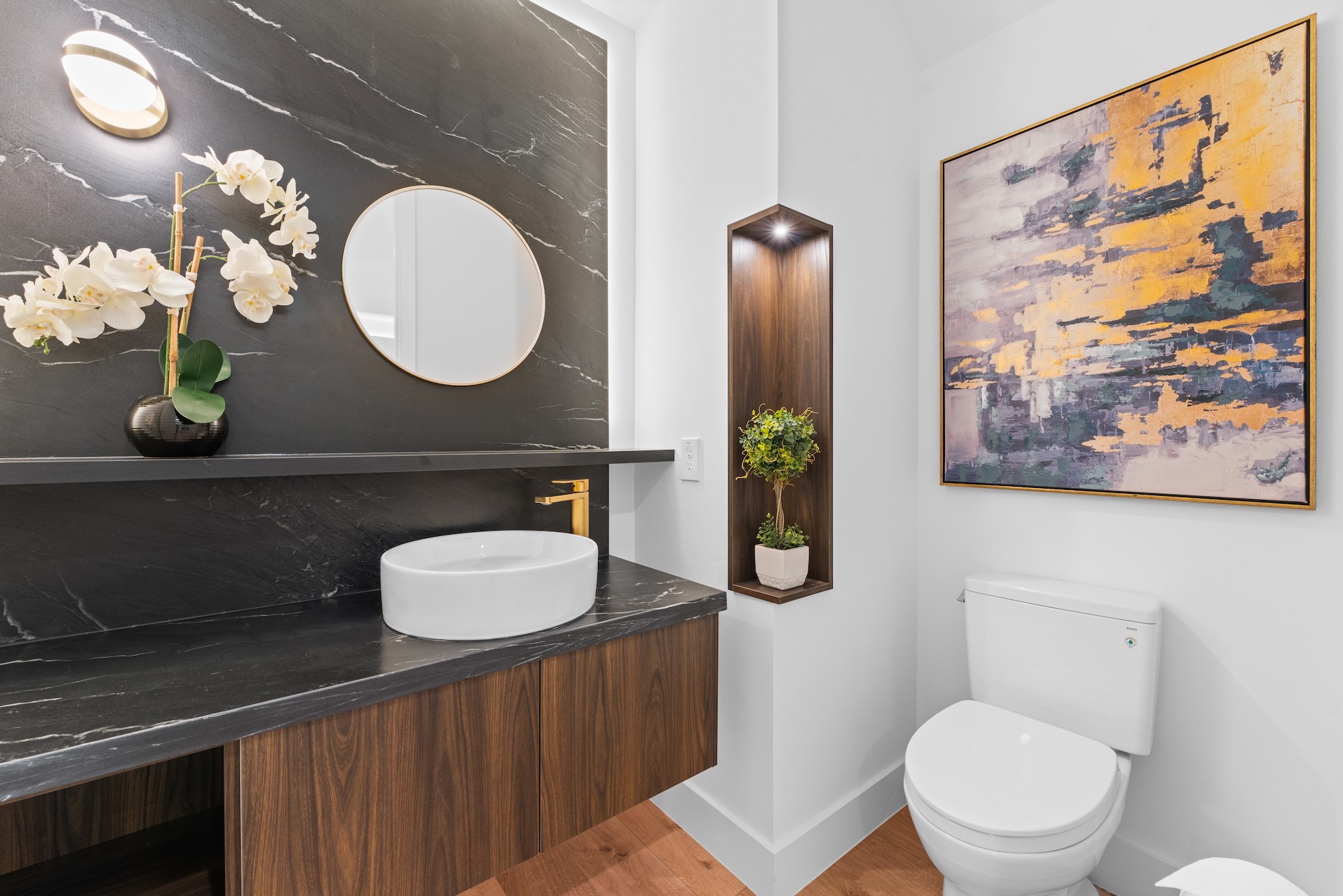 6711 Housman Houston, TX 77055 - Photo 29 of 49 a bathroom with a toilet a sink and a mirror