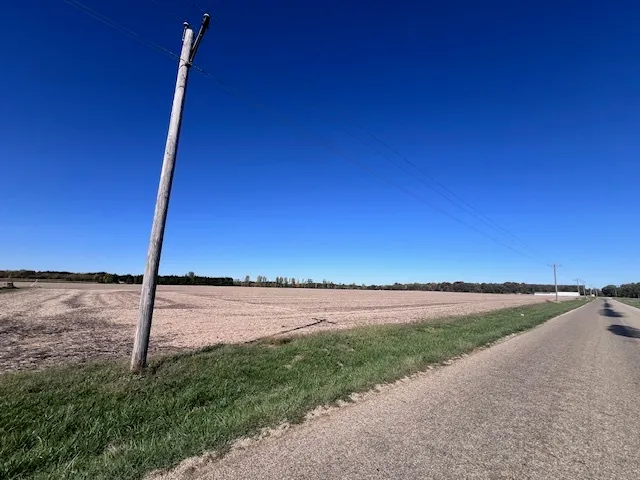 a view of a road with an ocean view