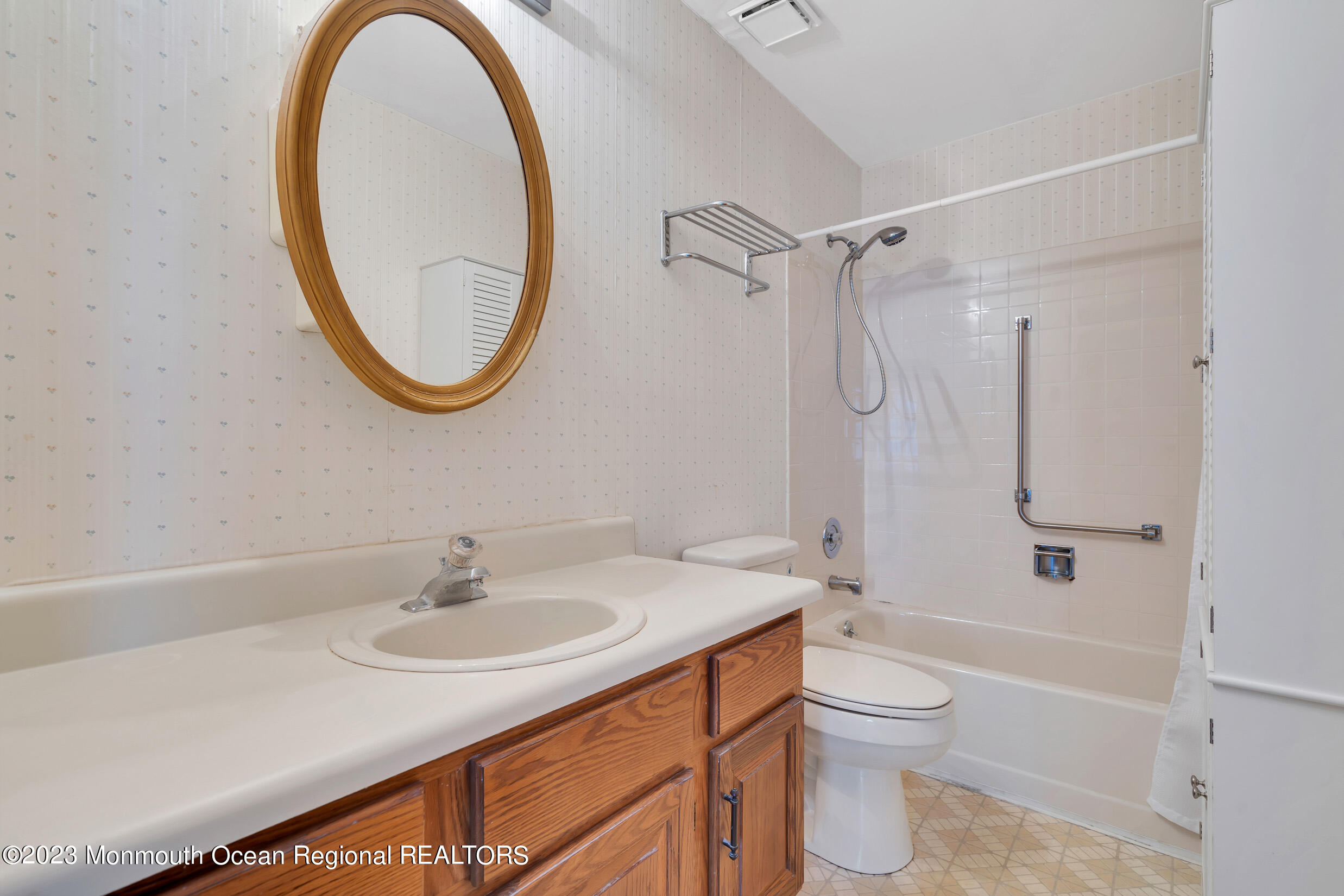 11 A Amherst Road Whiting, NJ 08759 - Photo 24 of 31 a bathroom with a sink a toilet and a mirror