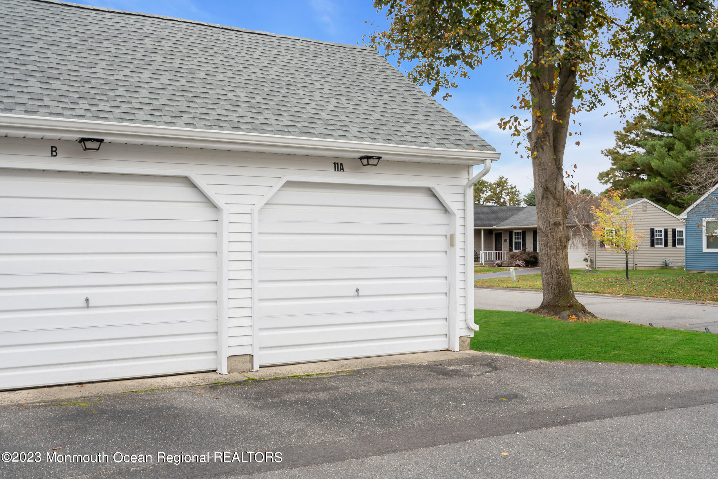 11 A Amherst Road Whiting, NJ 08759 - Photo 30 of 31 a view of a house with a garage
