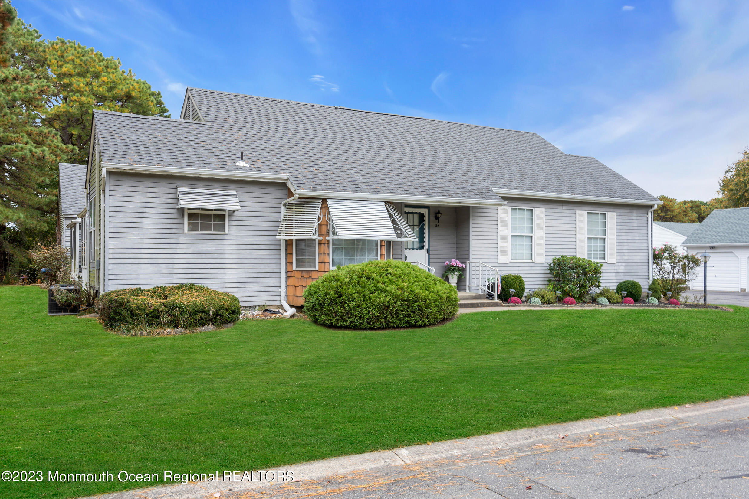 11 A Amherst Road Whiting, NJ 08759 - Photo 3 of 31 a front view of a house with a garden