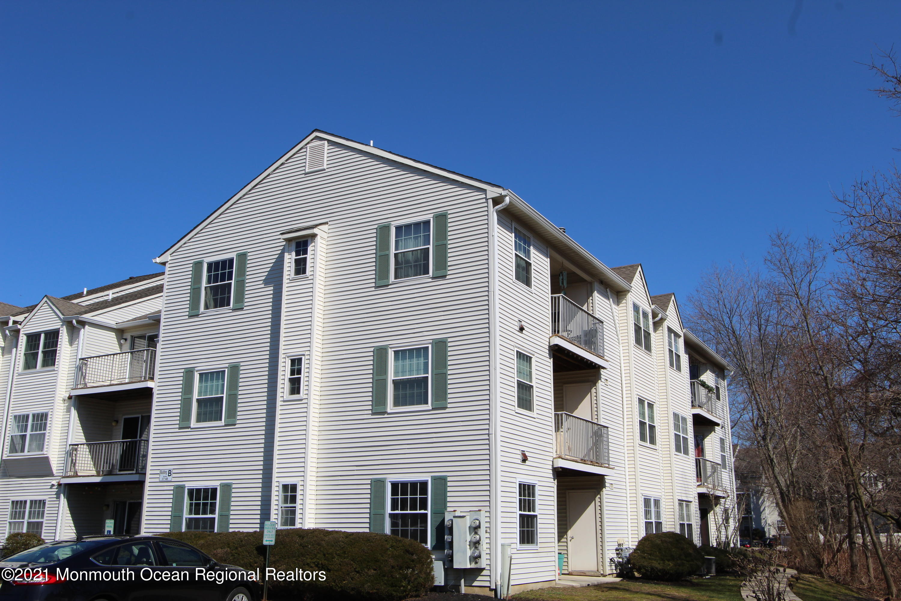 231 Atlantic Street, Unit 48 Keyport, NJ 07735 - Photo 2 of 32 a view of a house with a yard