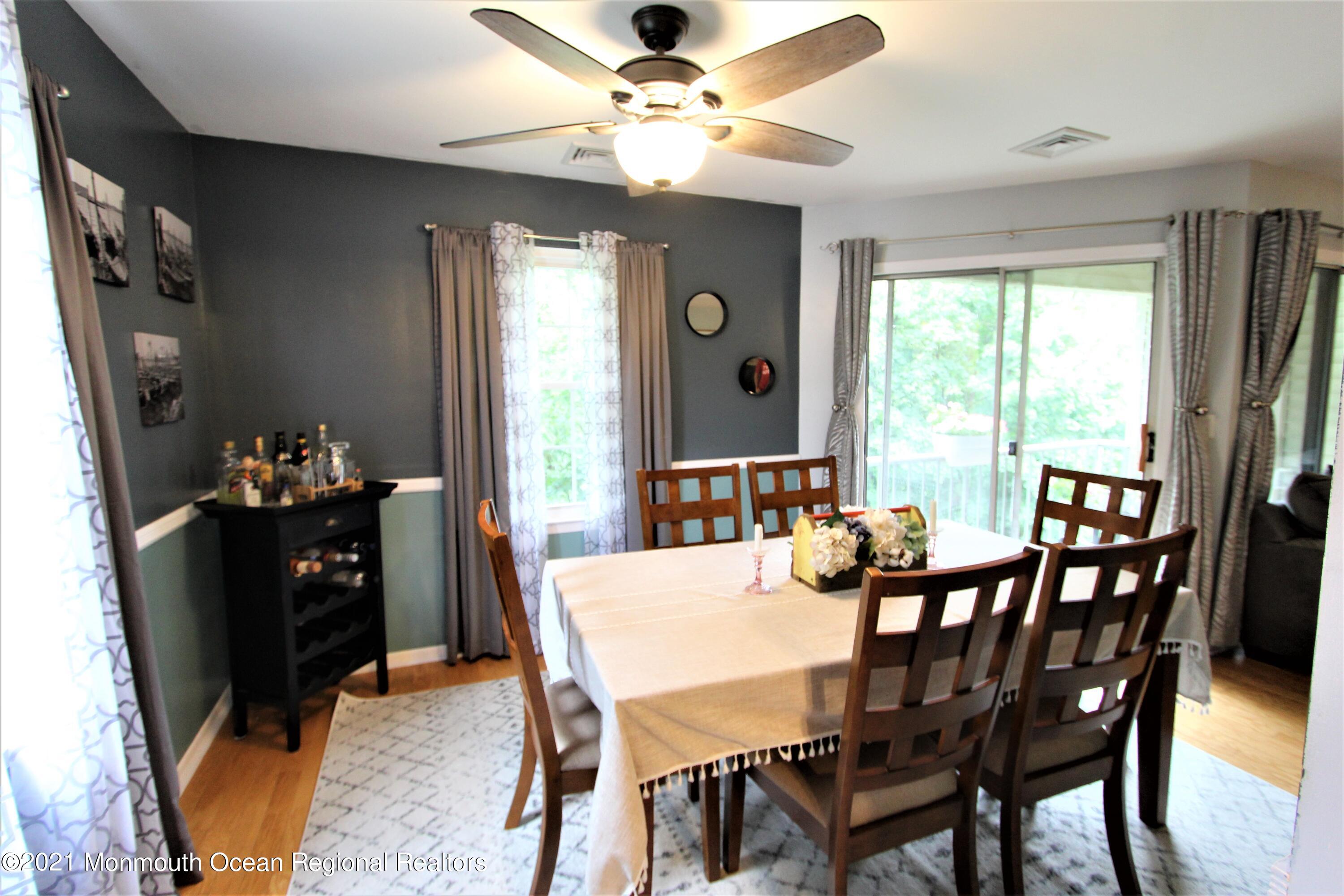 231 Atlantic Street, Unit 48 Keyport, NJ 07735 - Photo 13 of 32 a dining room with furniture and window