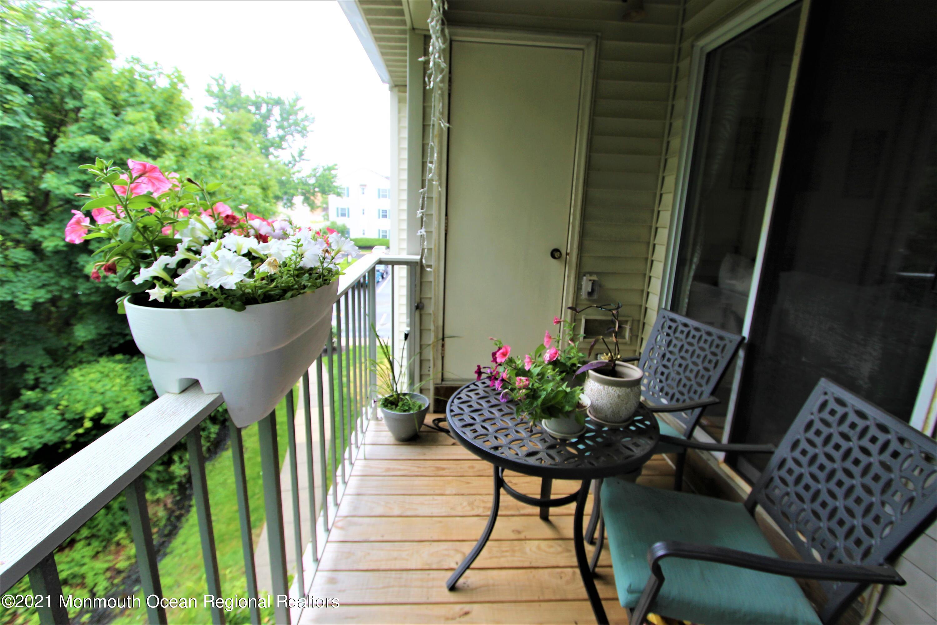 231 Atlantic Street, Unit 48 Keyport, NJ 07735 - Photo 10 of 32 a front view of a house having patio