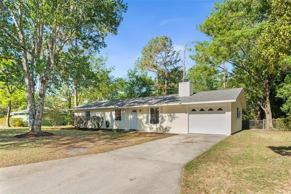 a house with trees in front of it