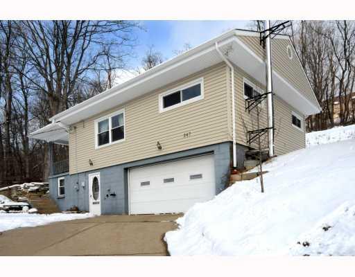 247 Weavertown Road Canonsburg, PA 15317 - Photo 1 of 13 Exterior Front. New vinyl siding, gutters, downspouts and windows. Large cement driveway w/ side parking too.