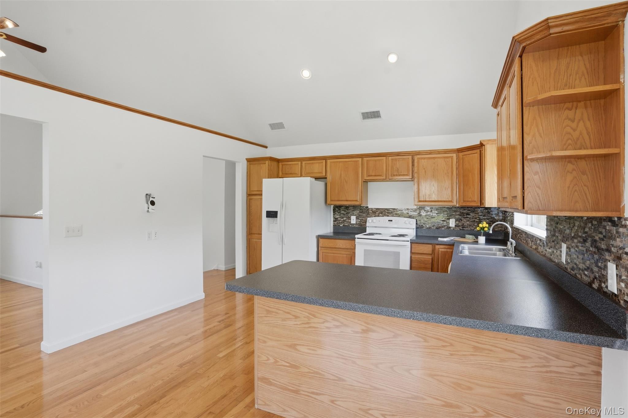 160 Pirog Road Pine Bush, NY 12566 - Photo 15 of 50 a large kitchen with kitchen island a large counter top space a sink and stainless steel appliances
